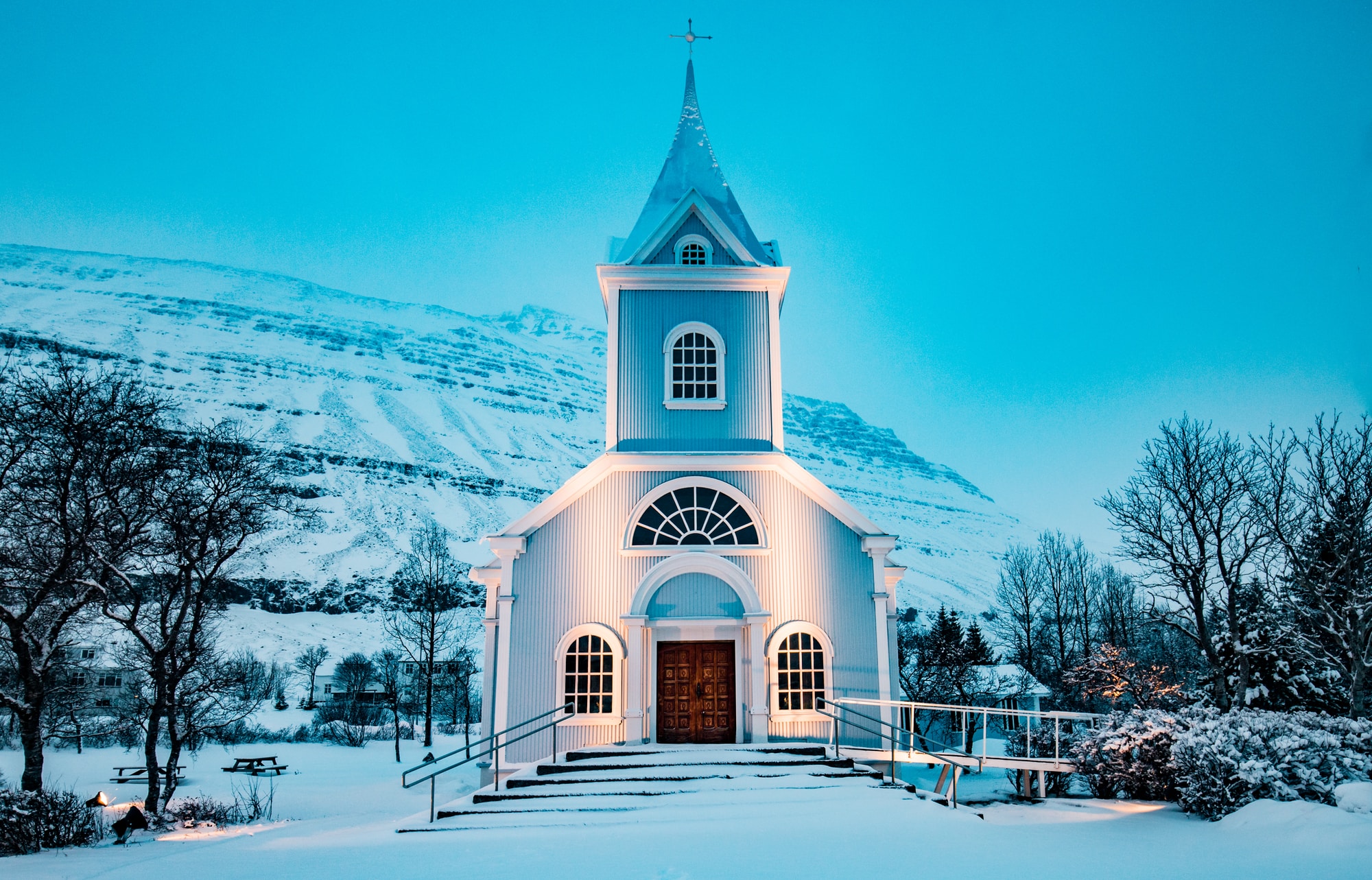 blue church during winter season